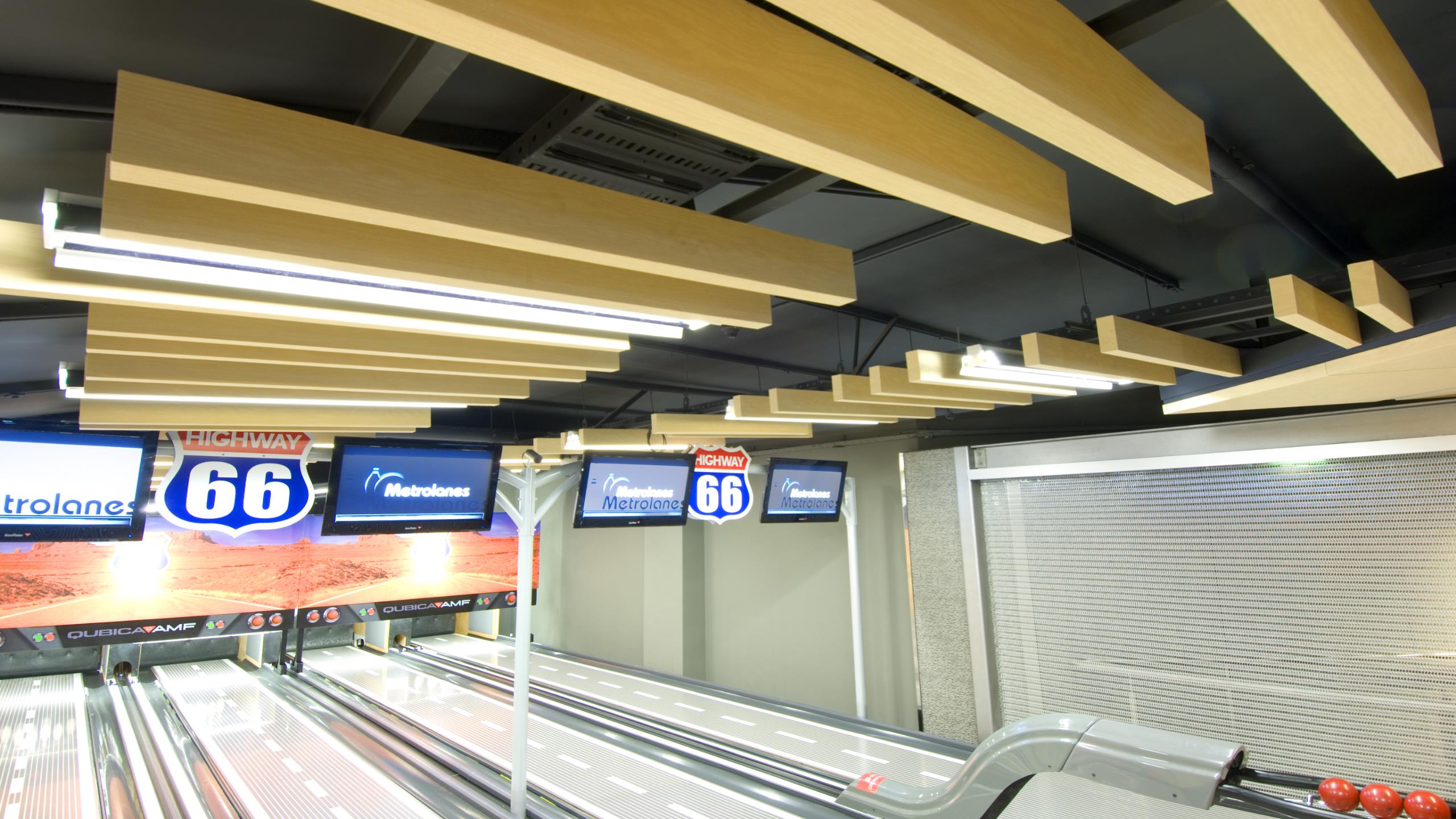 Metro Bowling Alley, AKLD - Baffle Beams + wood-grain Sonatex